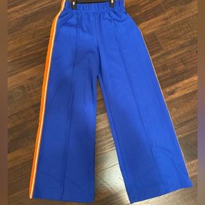 Baggy retro blue pants with orange on the sides